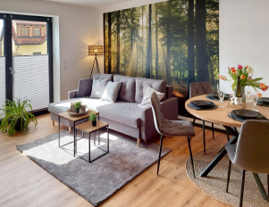 Heller Wohnbereich einer Ferienwohnung in der Erlebnisregion Ochsenkopf